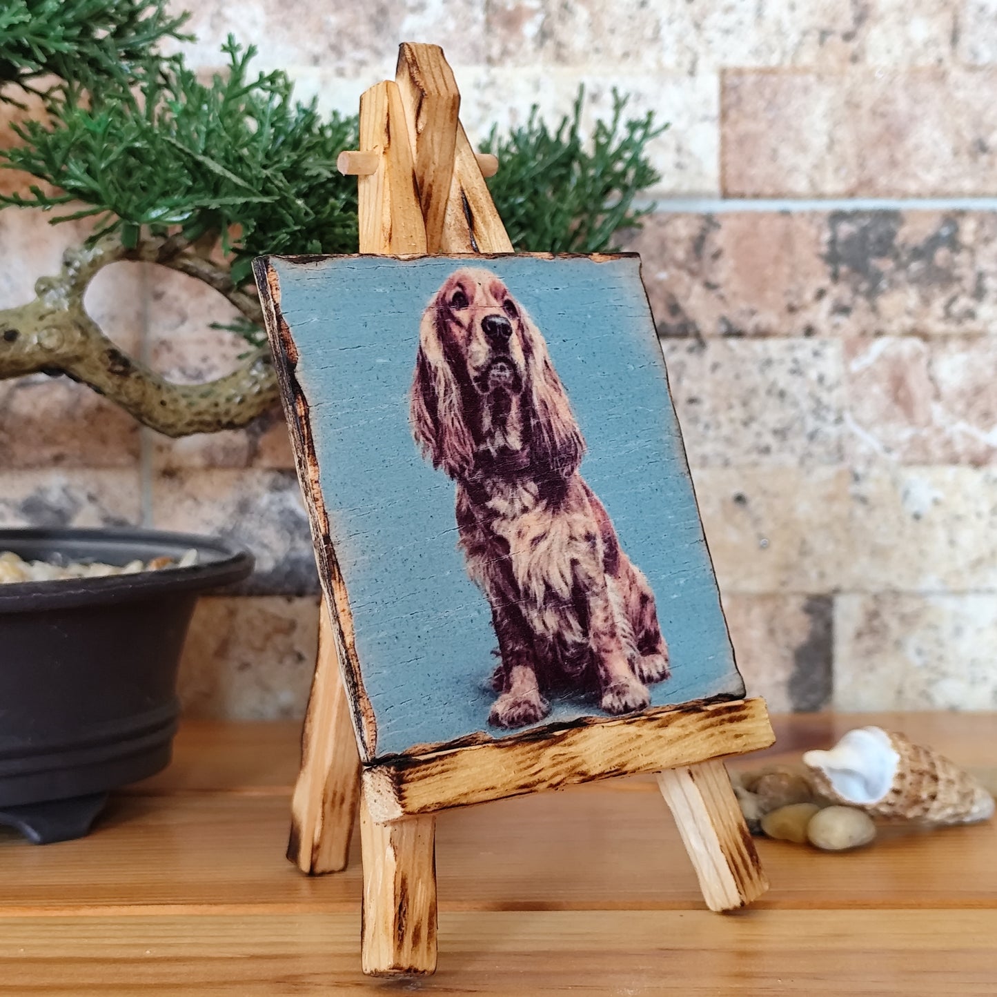 Retrato artesanal del Cocker Spaniel sobre madera