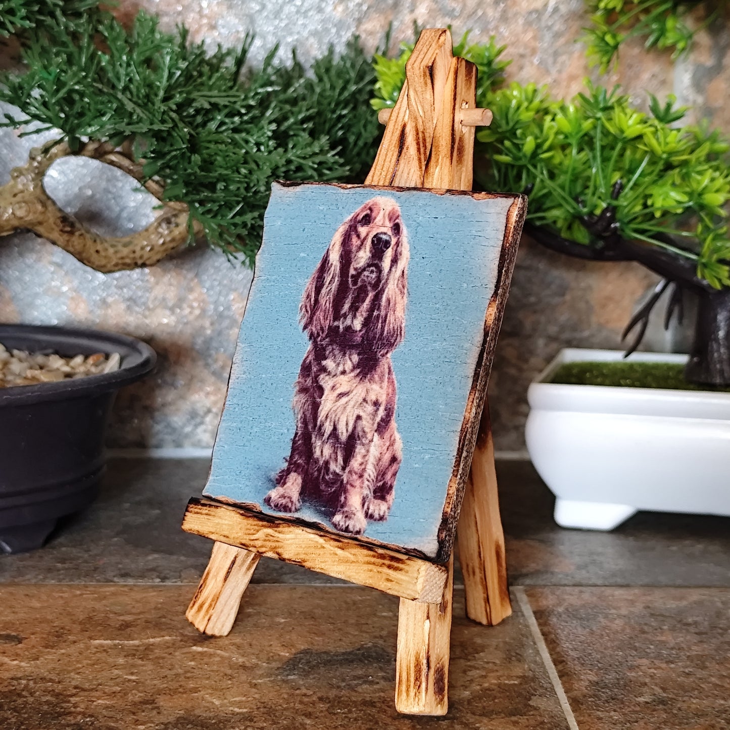 Retrato artesanal del Cocker Spaniel sobre madera